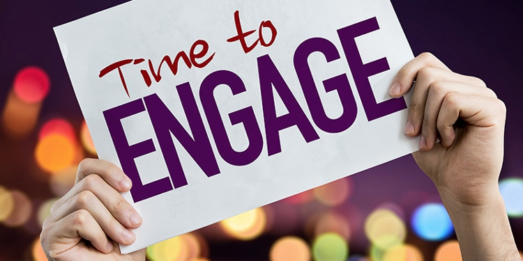 remote work engagement A person holding a sign that says time to engage
remote work engagement
