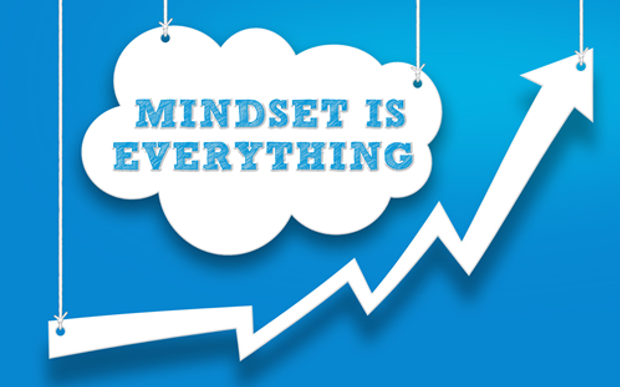 A close up of a sign
a sign with the words mindset is everything
Description automatically generated